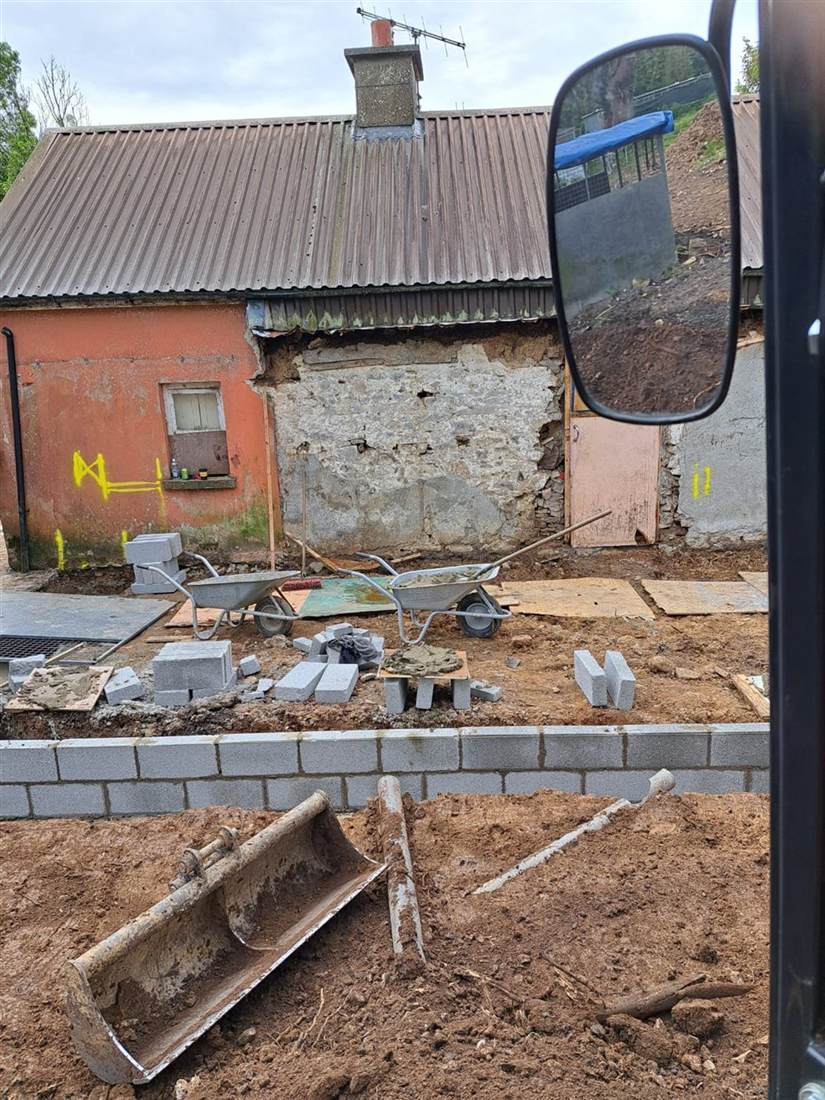 Lime mortar being used to repoint stonework